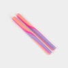 Set of colorful straws on a light gray background