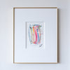 Framed abstract artwork with colorful design on a white wall