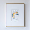 Abstract acrylic painting in gold frame with wide white mat on white wall
