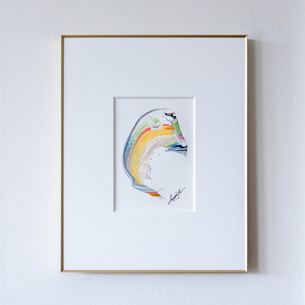 Abstract acrylic painting in gold frame with wide white mat on white wall
