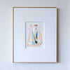 Soft pastel painting in slim gold frame on white wall