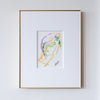 Framed abstract artwork with colorful design on a white wall