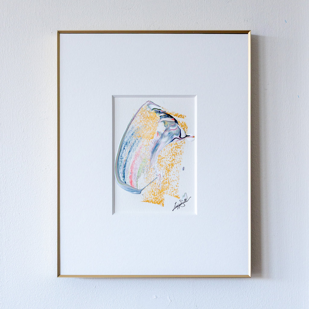 Swish acrylic abstract painting in slim gold frame on white wall