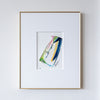 Framed abstract painting of a colorful abstract design on a white wall