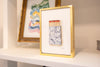 "Ordinary Beauty" Watercolor Matches Painting in 5.25” x 7.25” Gold Frame