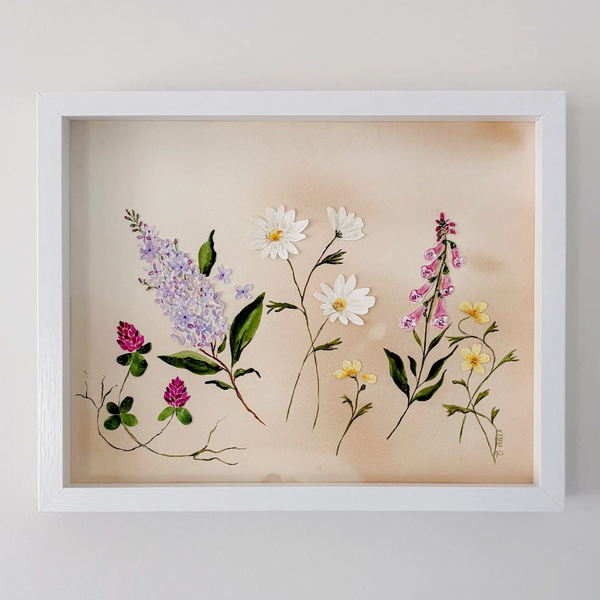 Framed botanical illustration of flowers on a beige background