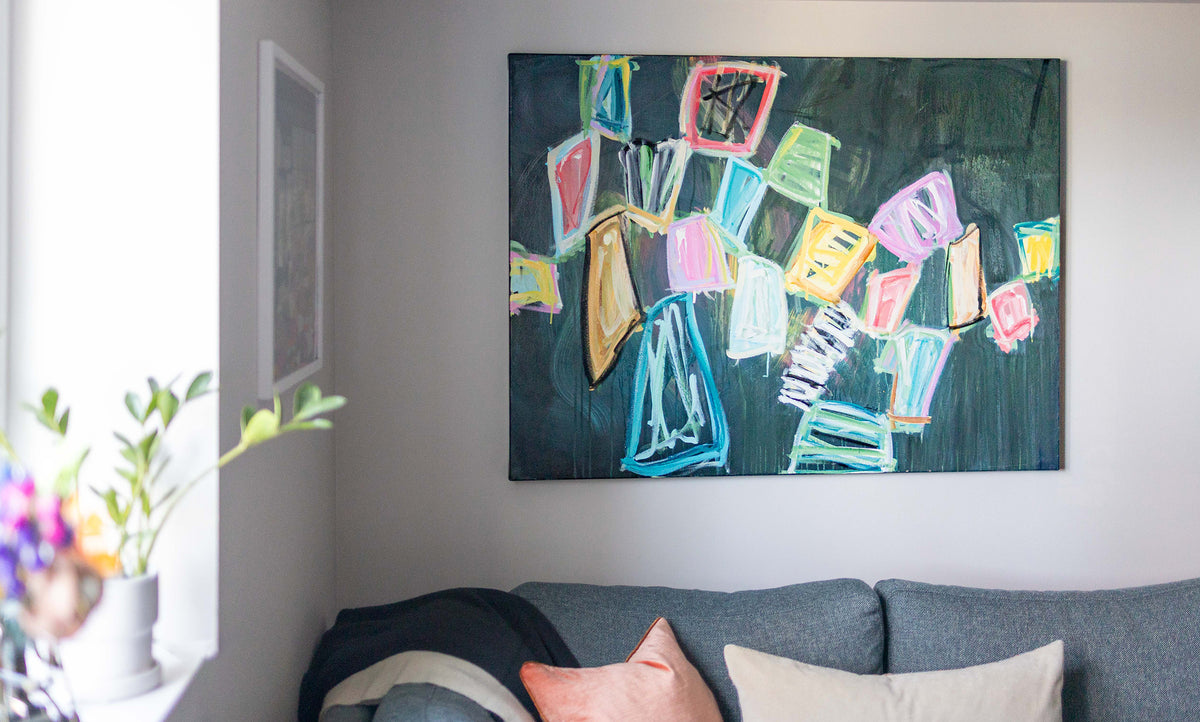 One of many colorful paintings that changed how Lola and Joe live in their home.
