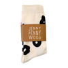 Beige sock with black floral patterns and a brown label reading 'Jenny Penny Wood' on a white background.