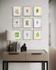 Modern interior with a beige desk and spring watercolor gallery wall