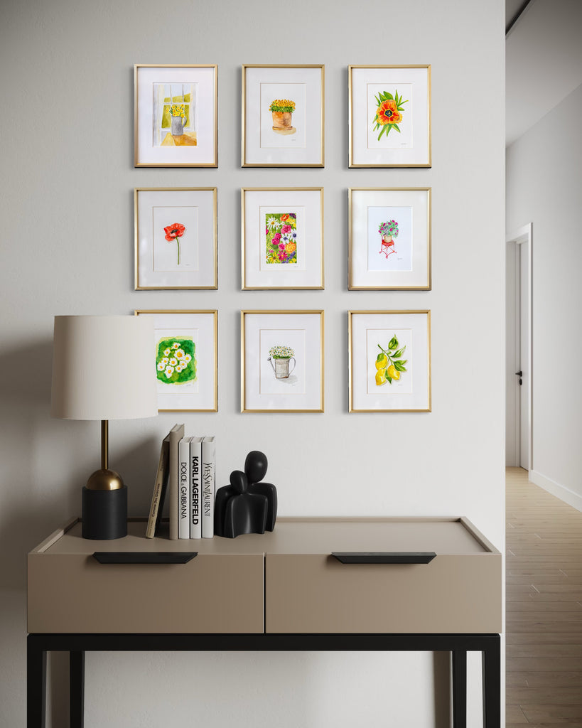 Modern interior with a beige desk and spring watercolor gallery wall