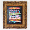 Framed abstract artwork with colorful horizontal stripes on a black background
