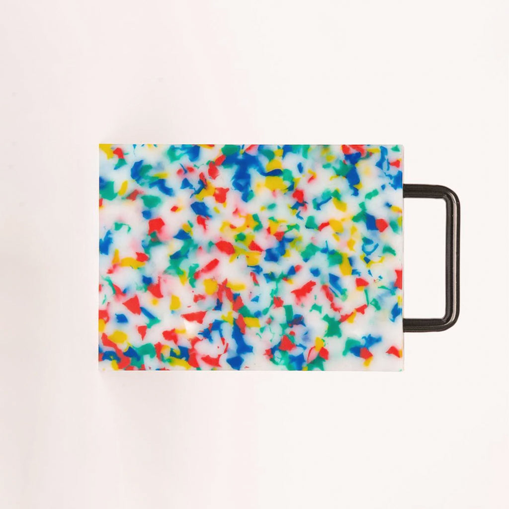 Confetti colored cutting board with black handle