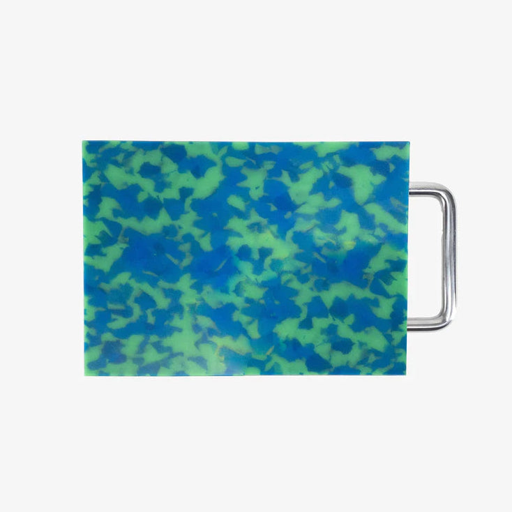 Rectangular cutting board with blue and green camouflage pattern on a white background
